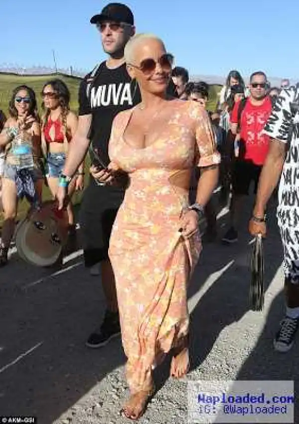 Photos: See the outfit Amber Rose steps out in 